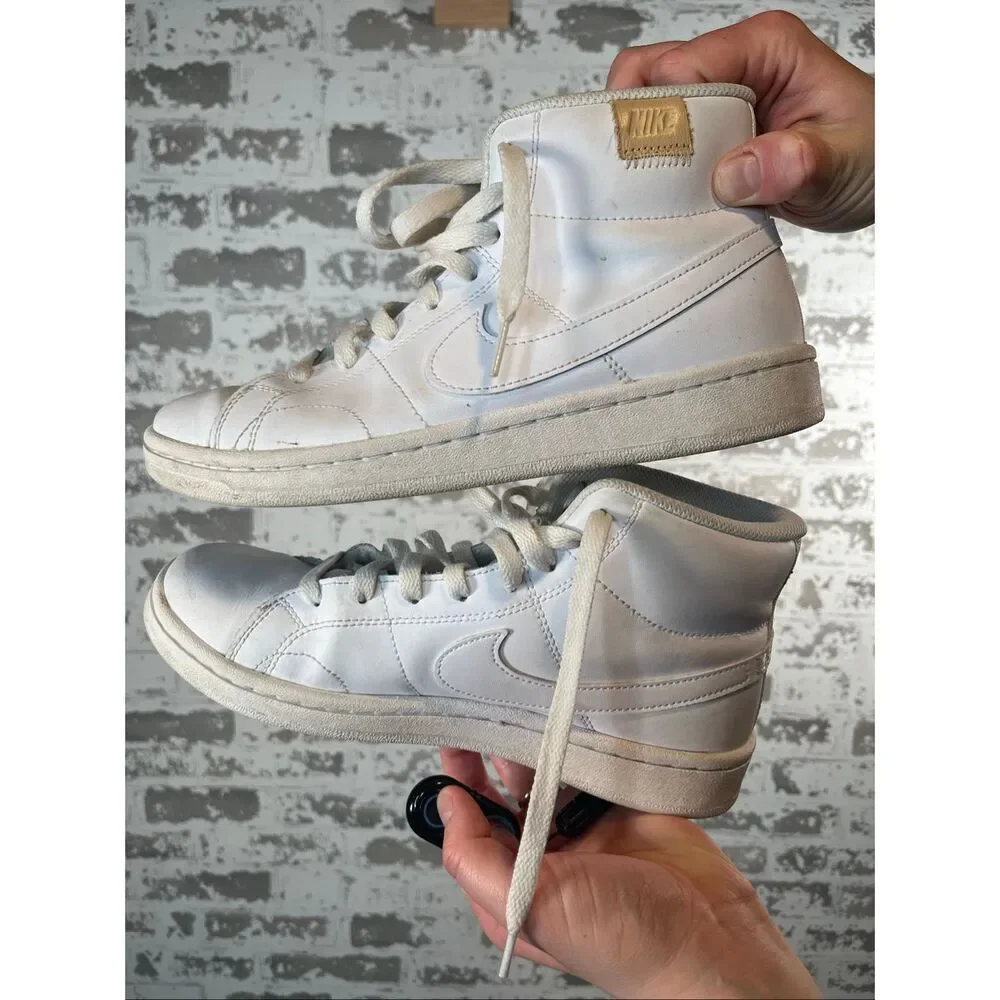Nike | women white leather high top shoes